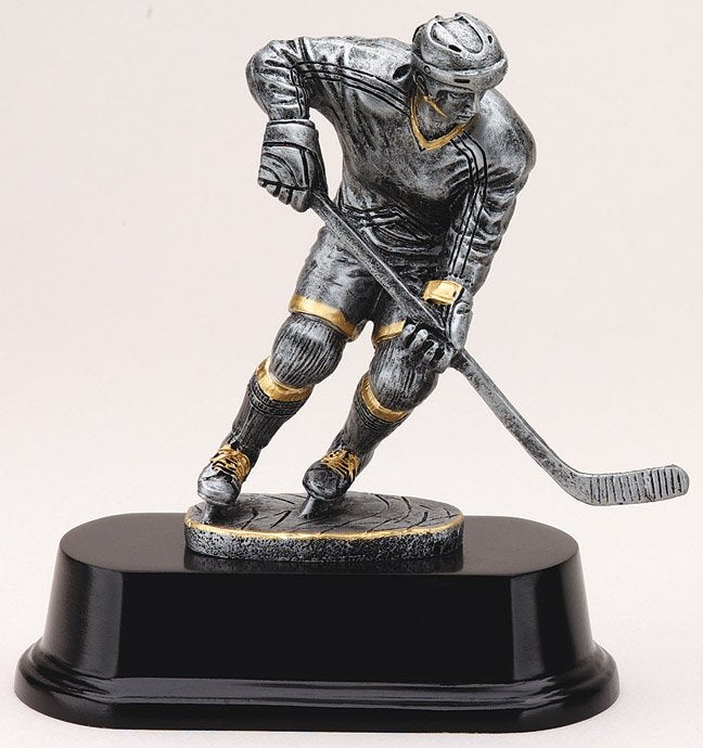 Female ice hockey player trophy in antique silver on black base