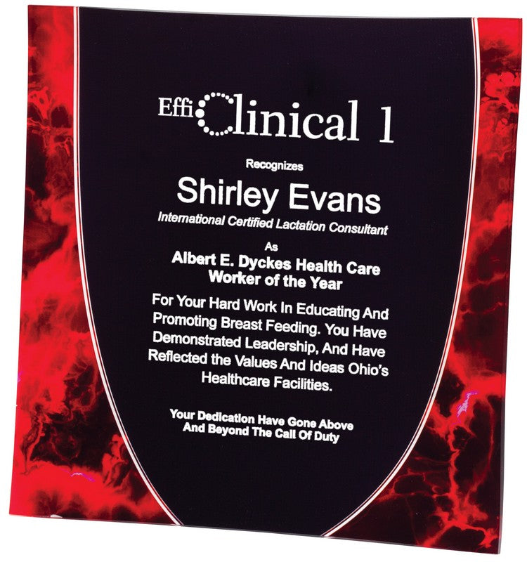 Red marbleized cloud pattern square acrylic award with black center panel, engraved in white
