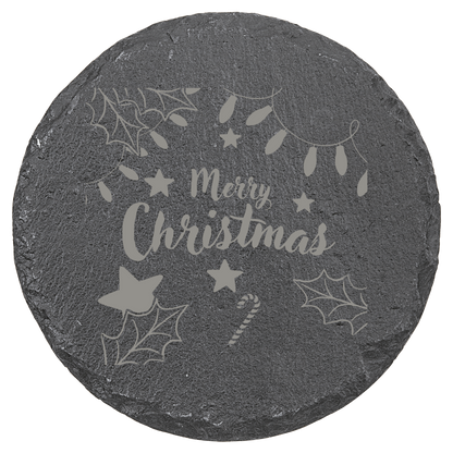 Round slate coaster with 'Merry Christmas' engraving and festive designs on a clear background