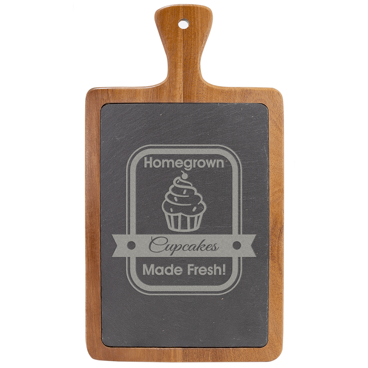 Wooden cutting board with slate insert displaying 'Homegrown Cupcakes Made Fresh!' text on a clear background