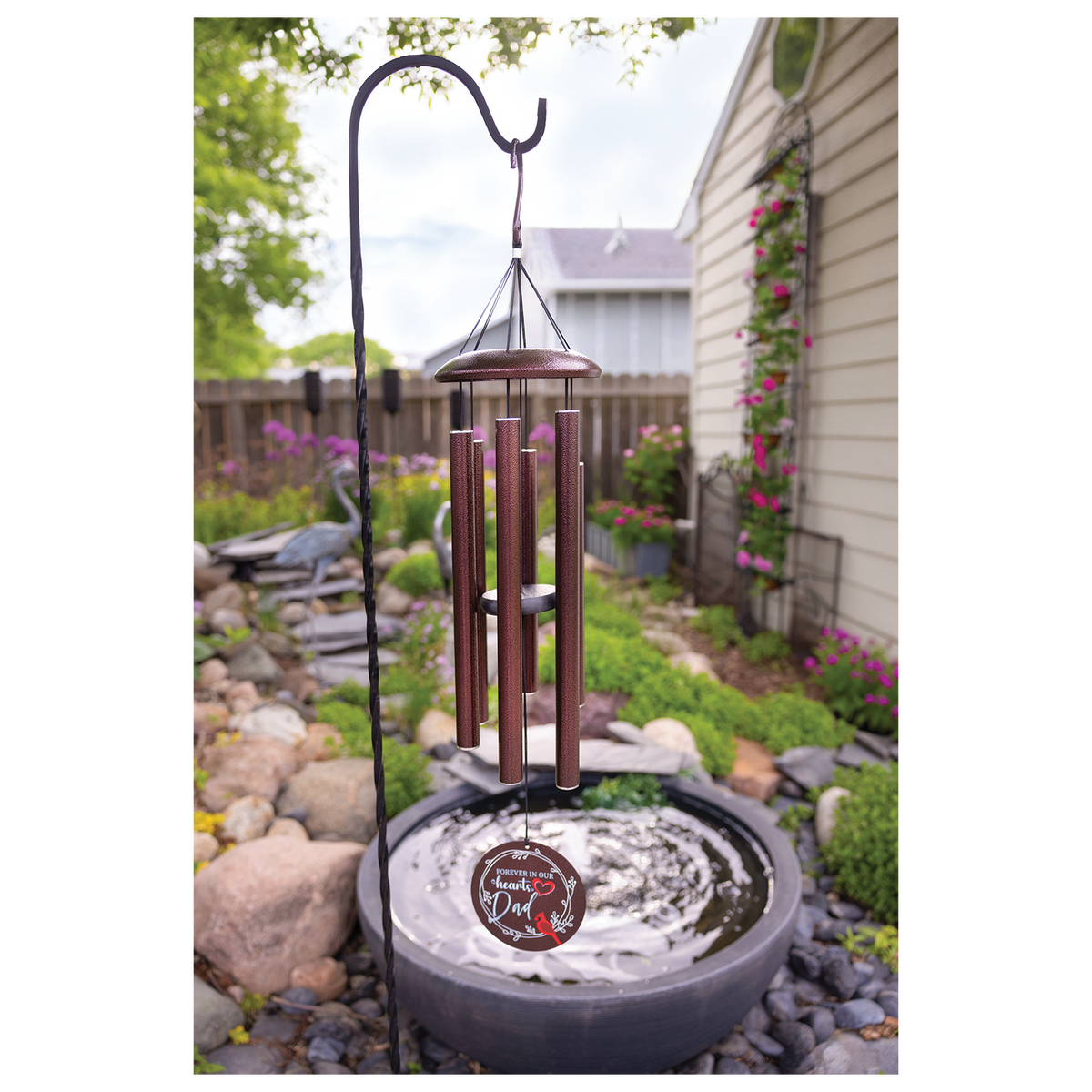 36 inch copper wind chime hanging on a porch