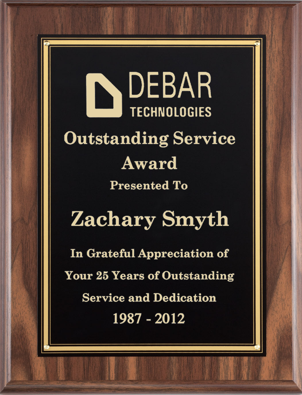 Walnut finish plaque with a black plate and gold border