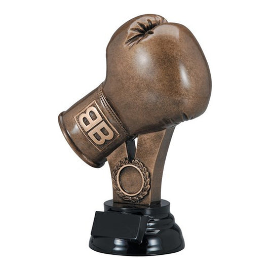 Antique bronze boxing glove trophy on a black pedestal base