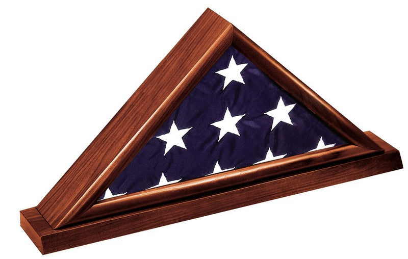 Dark cherry flag display case holding a folded 3' x 5' American flag on a matching cherry base with room for an engraved plate