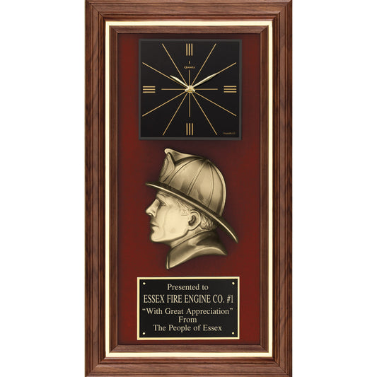 Tall walnut framed plaque with black clock, brass firefighter helmet casting and red velour