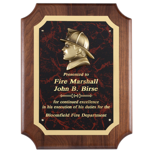 Walnut plaque with brass firefighter helmet casting on a red marble engraving plate