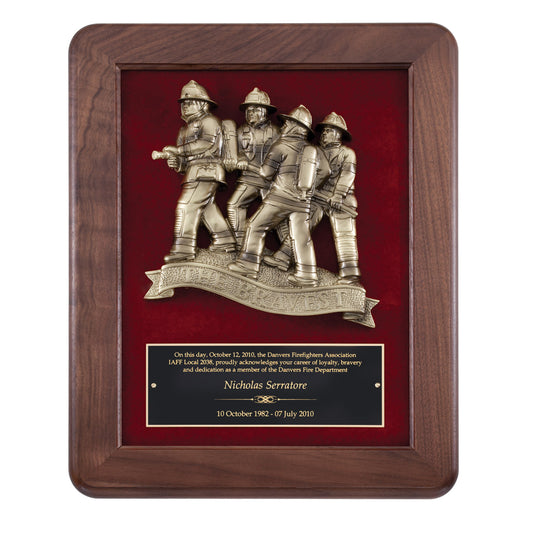 Walnut framed plaque with antique brass casting of four firefighters on red velour