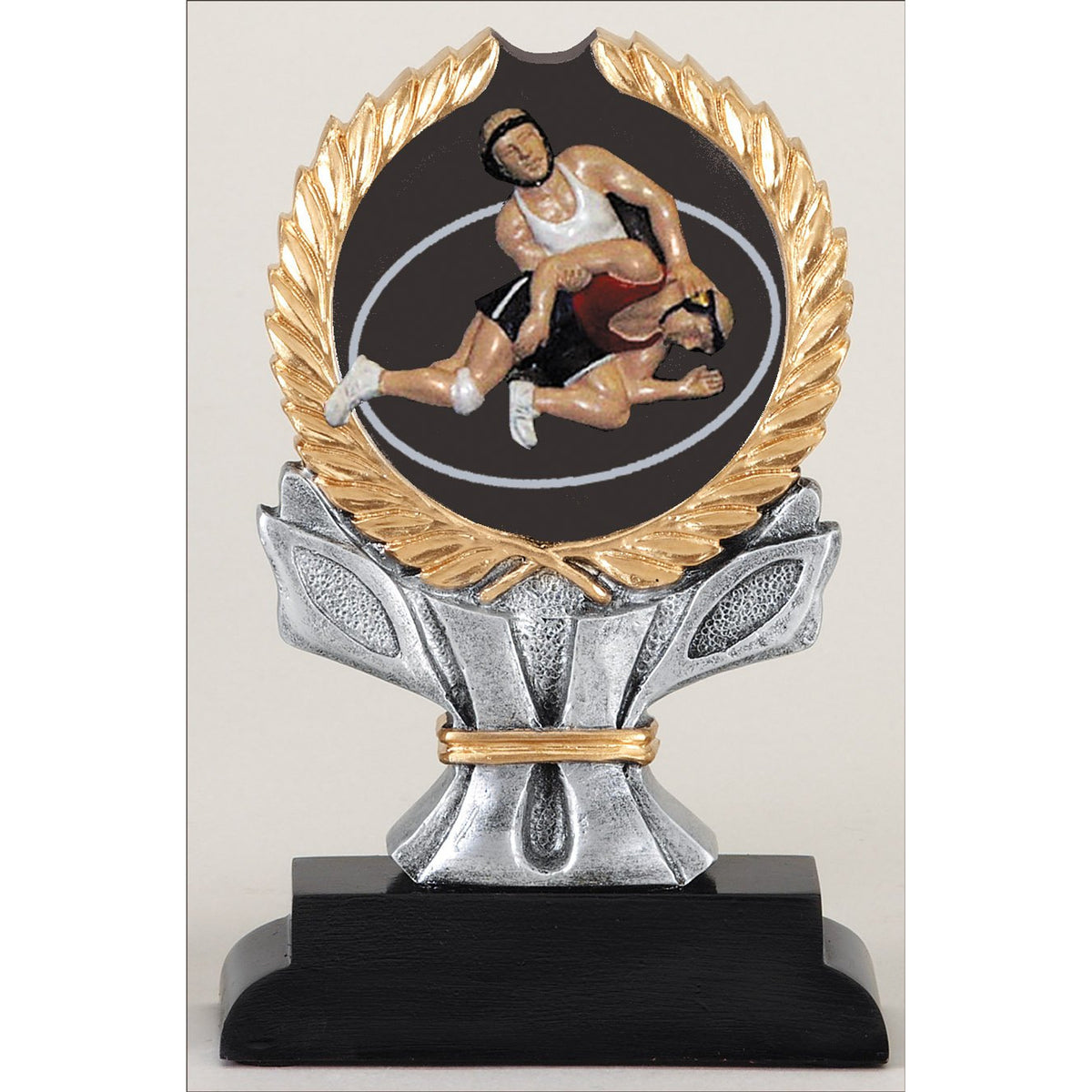 Impact wrestling trophy with full-color wrestling emblem in a gold wreath on a silver column and black base
