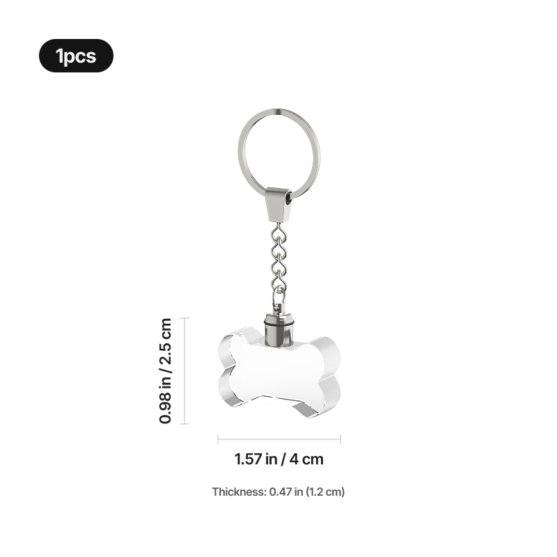 Glowing bone-shaped pet memorial crystal keychain, close-up