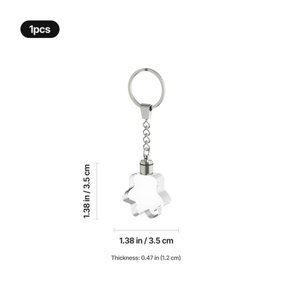 Glowing paw print pet memorial crystal keychain, close-up