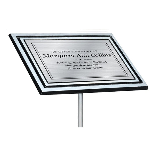 Black and silver cast aluminum memorial garden plaque on a stake with engraved silver plate