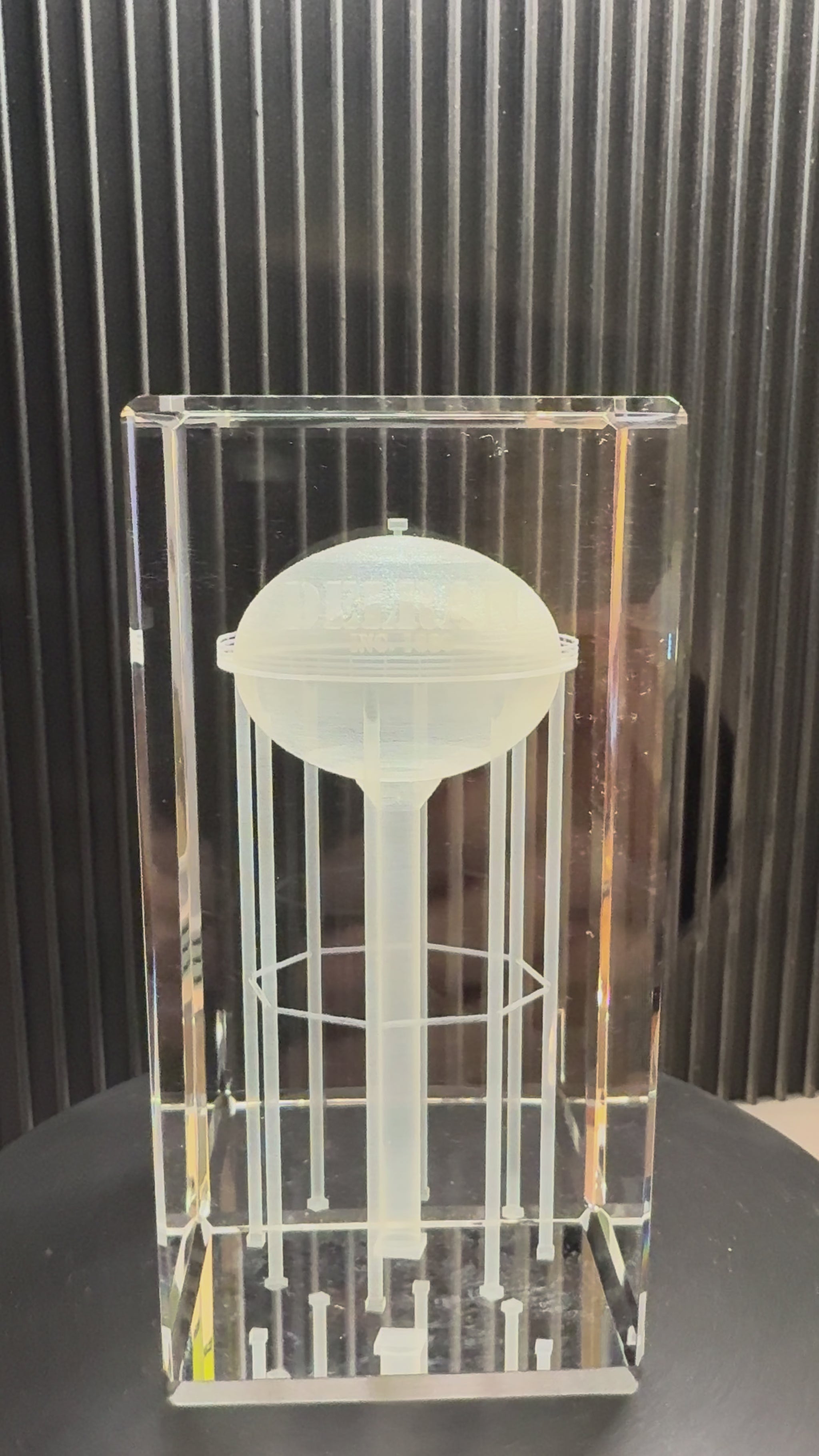 rotating 3d crystal block with water tower design