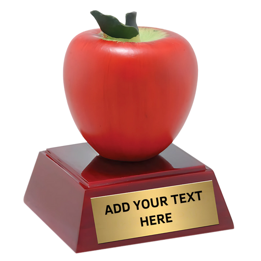 red apple on rosewood base