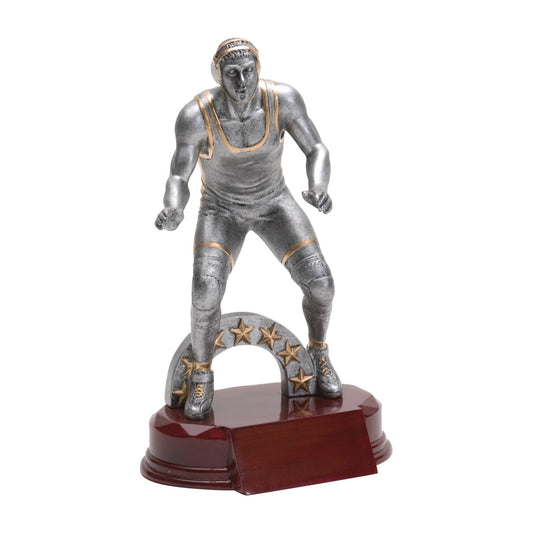 7 3/4 inch silver wrestling trophy with a wrestler in stance under a gold star arch on a rosewood-finish base