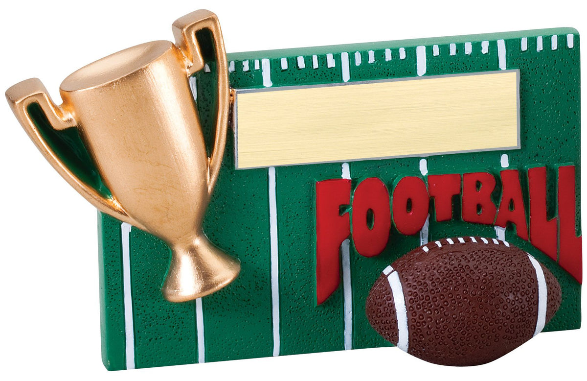 Football winners cup resin award, green football field with gold cup and football