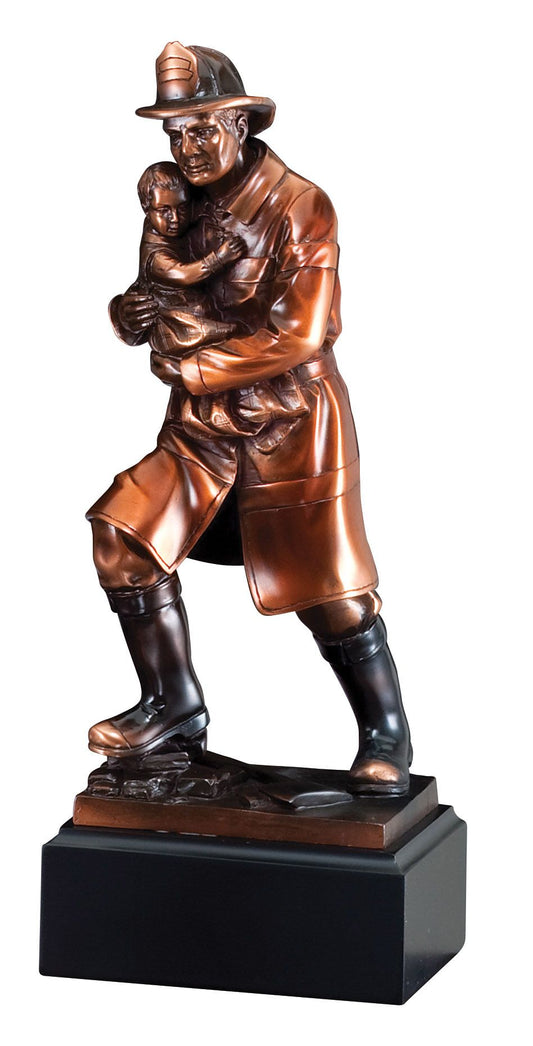 Resin figure of a firefighter carrying a child to safety