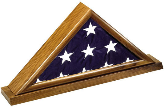 Solid walnut flag display case holding a folded 3' x 5' American flag on a matching walnut base with room for an engraved plate