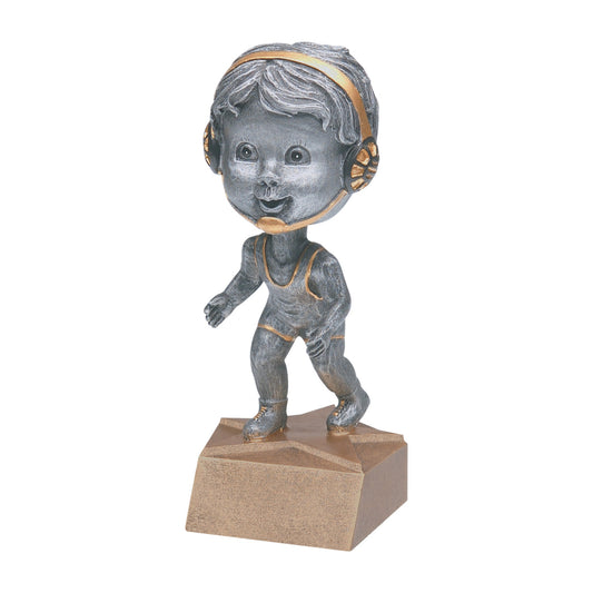 Wrestling bobblehead trophy with a silver young wrestler in headgear on a tan base
